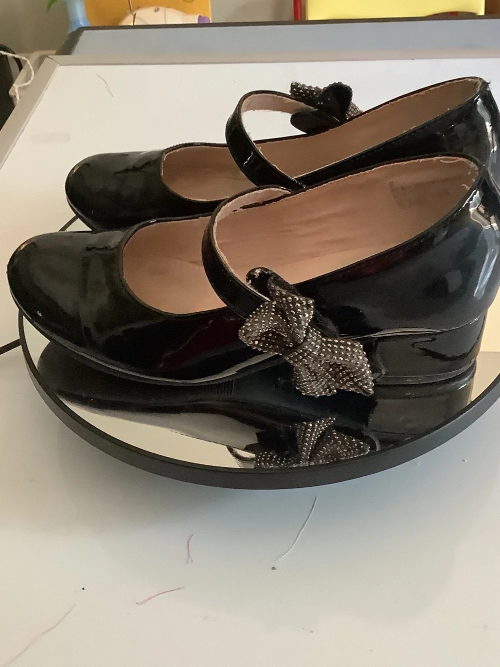 cupcakes & cashmere Black Patent Mary Jane Wedges with Embellished Bow